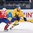 MINSK, BELARUS - MAY 13: Sweden's Dennis Rasmussen #40 pulls the puck away from Norway's Mats Trygg #23 during preliminary round action at the 2014 IIHF Ice Hockey World Championship. (Photo by Richard Wolowicz/HHOF-IIHF Images)

